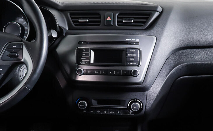 Kia Rio - Фото 12