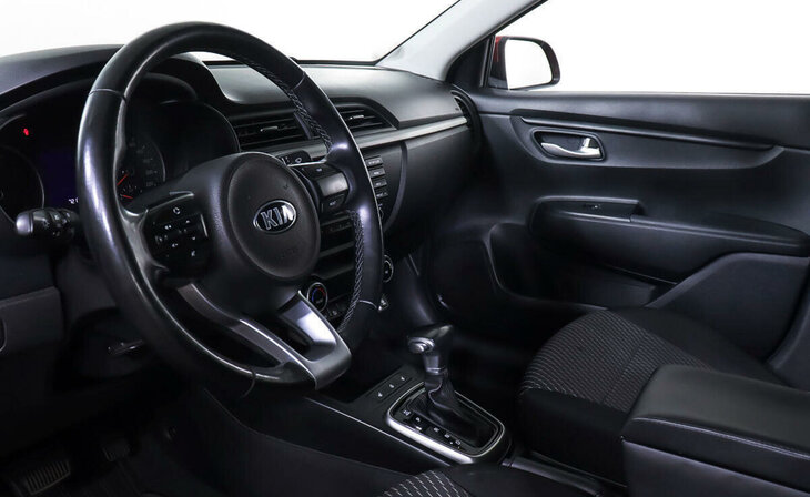 Kia Rio - Фото 11