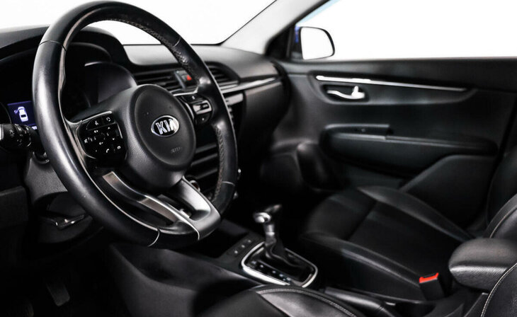 Kia Rio - Фото 8