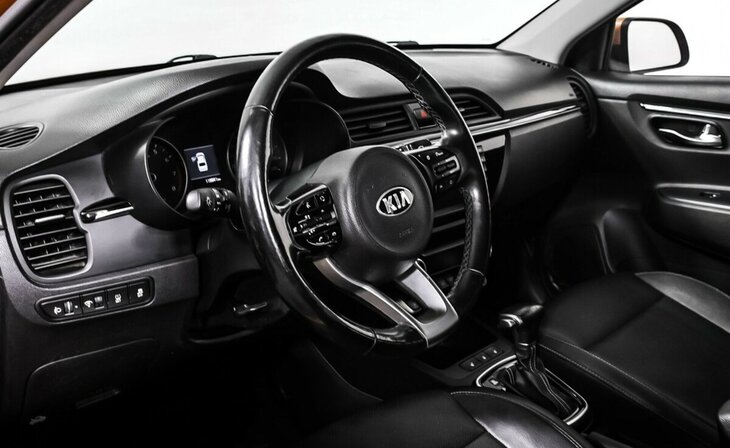 Kia Rio - Фото 8