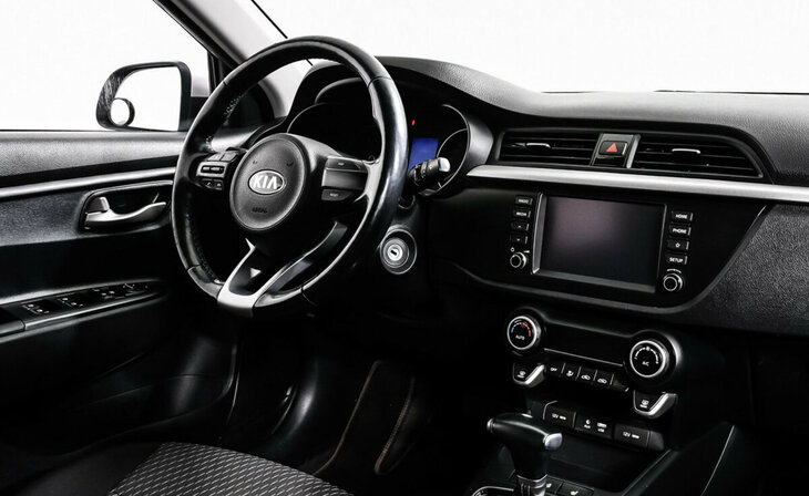 Kia Rio - Фото 9