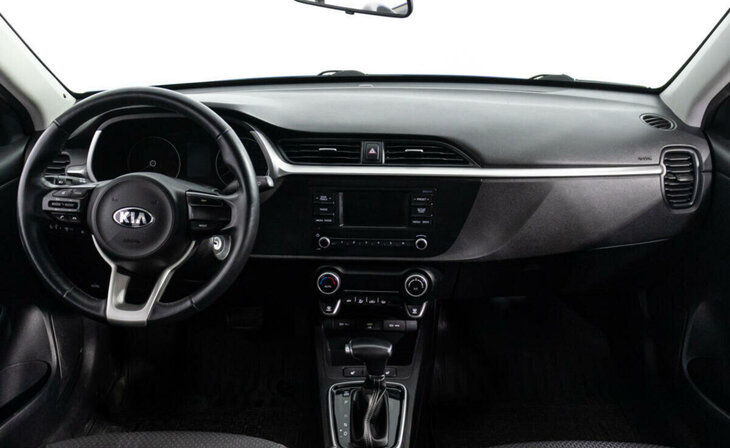 Kia Rio - Фото 11