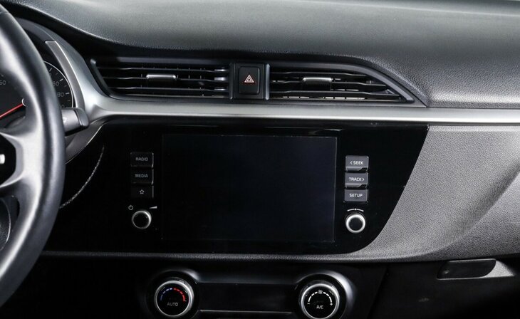 Kia Rio - Фото 11