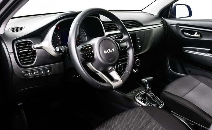 Kia Rio - Фото 9