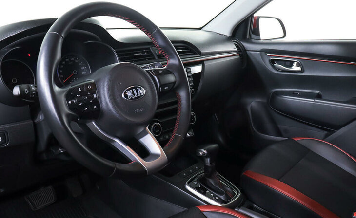 Kia Rio - Фото 11
