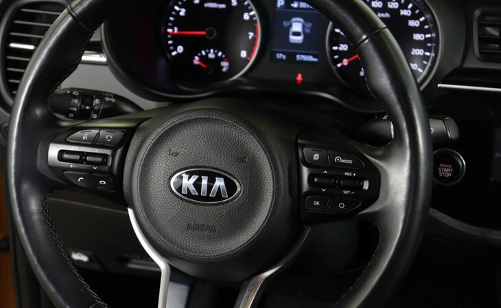 Kia Rio - Фото 11