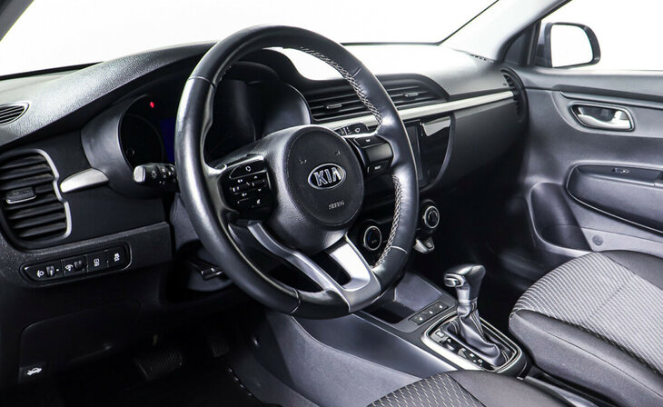 Kia Rio - Фото 11