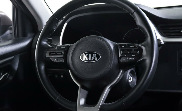 Kia Rio - Фото 11