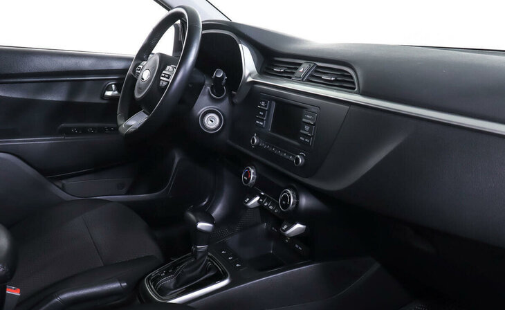 Kia Rio - Фото 8