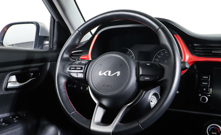 Kia Rio - Фото 11