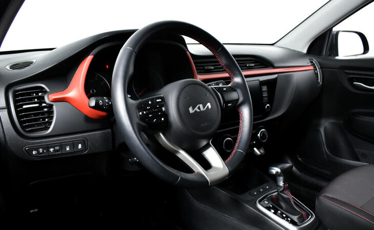 Kia Rio - Фото 10