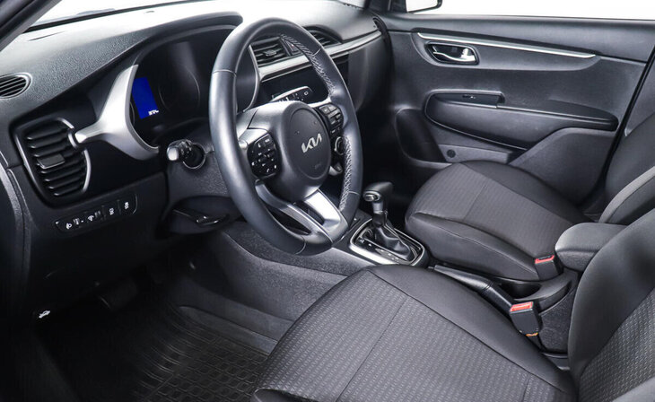 Kia Rio - Фото 11