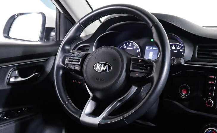 Kia Rio - Фото 11