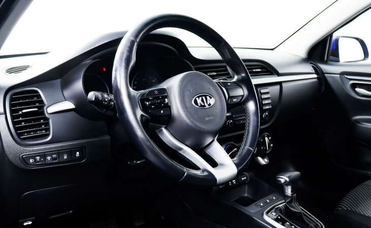 Kia Rio - Фото 10