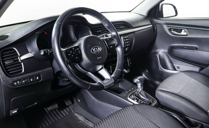 Kia Rio - Фото 11