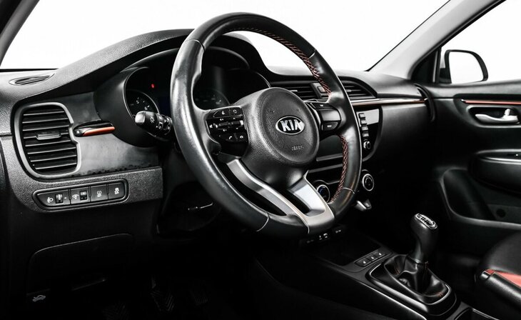 Kia Rio - Фото 7