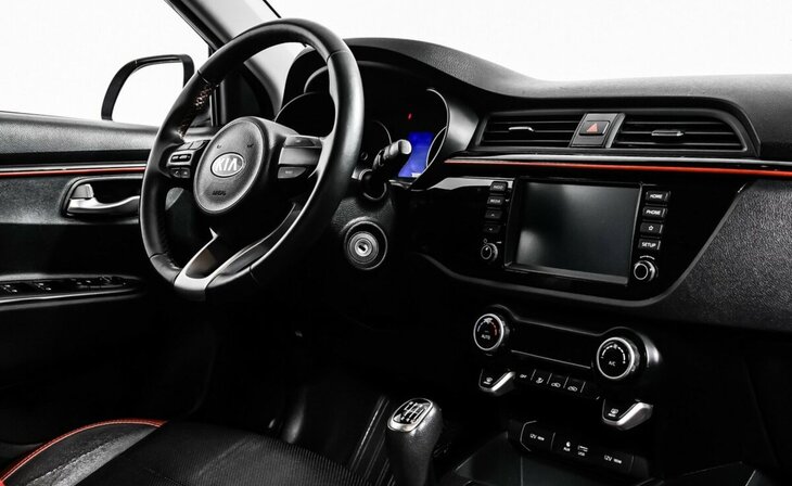 Kia Rio - Фото 8
