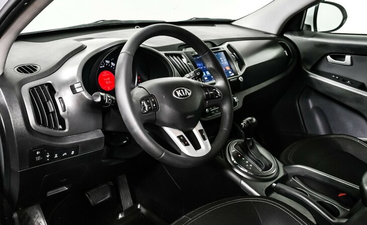 Kia Sportage - Фото 8
