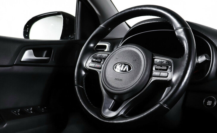 Kia Sportage - Фото 13