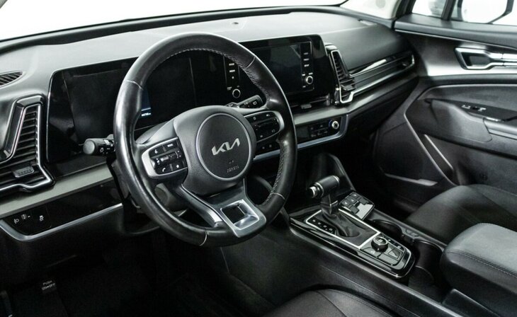 Kia Sportage - Фото 10