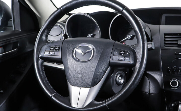 Mazda 3 - Фото 11