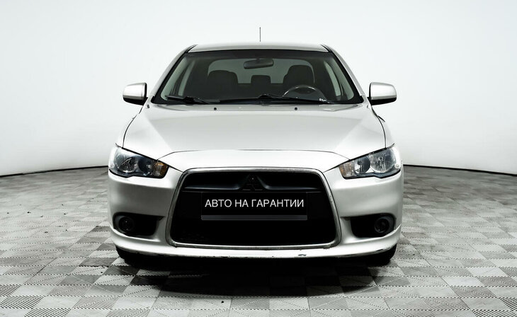 Mitsubishi Lancer - Фото 1