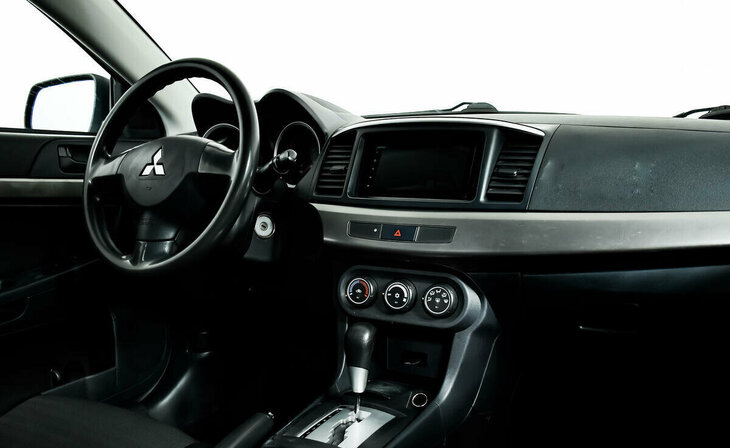 Mitsubishi Lancer - Фото 4
