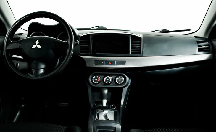 Mitsubishi Lancer - Фото 5