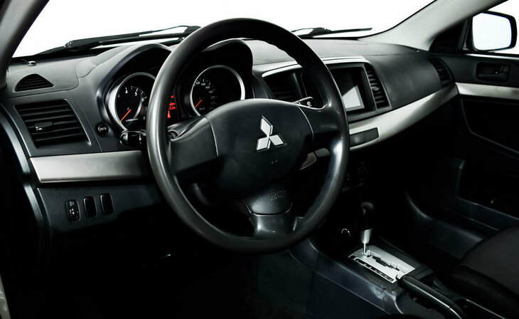 Mitsubishi Lancer - Фото 6