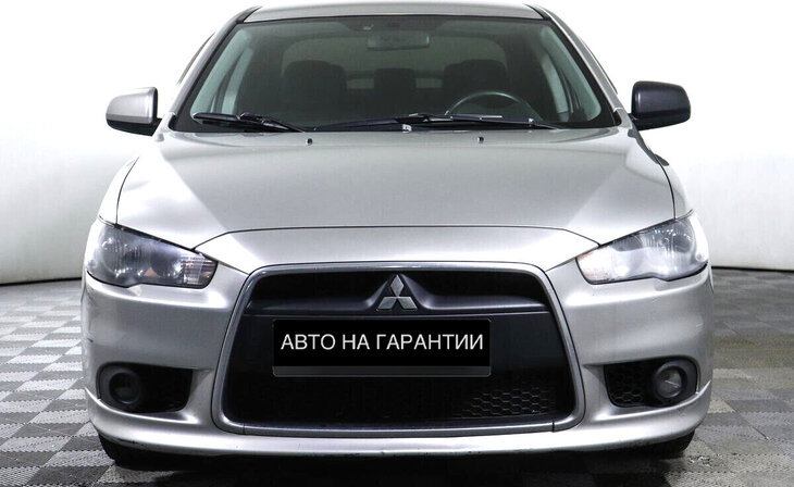 Mitsubishi Lancer - Фото 1