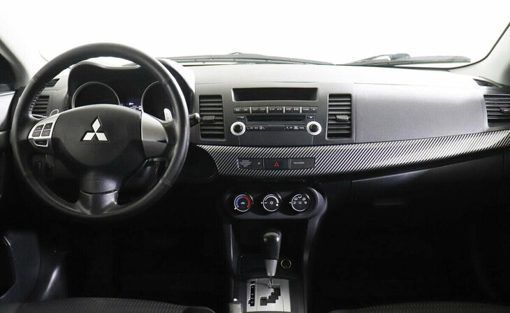 Mitsubishi Lancer - Фото 5