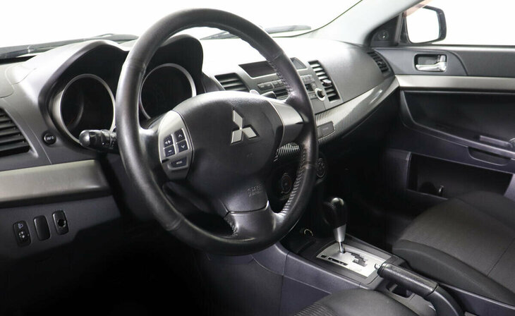 Mitsubishi Lancer - Фото 6