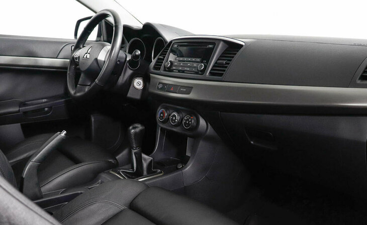 Mitsubishi Lancer - Фото 5