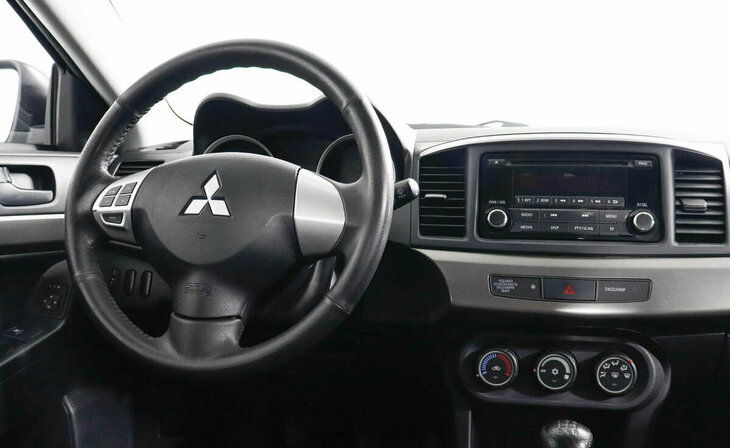 Mitsubishi Lancer - Фото 6