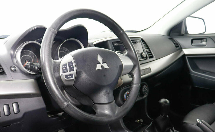 Mitsubishi Lancer - Фото 7