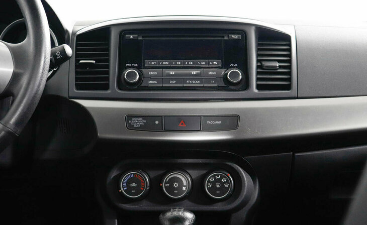 Mitsubishi Lancer - Фото 8