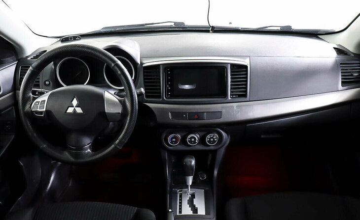 Mitsubishi Lancer - Фото 9