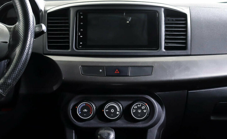 Mitsubishi Lancer - Фото 12