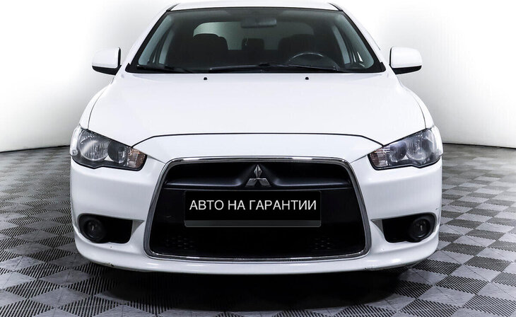 Mitsubishi Lancer - Фото 1