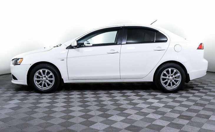 Mitsubishi Lancer - Фото 2