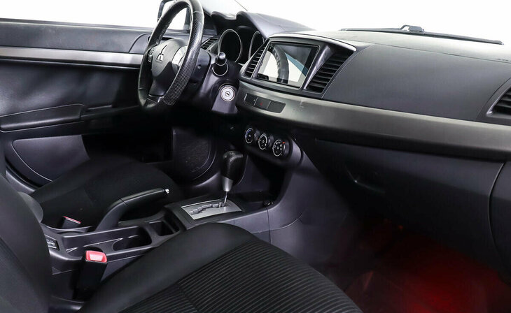 Mitsubishi Lancer - Фото 8