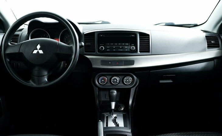 Mitsubishi Lancer - Фото 9