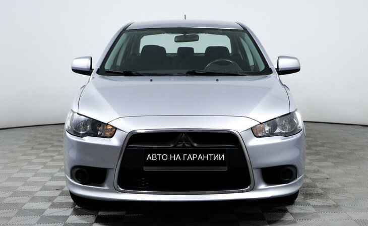 Mitsubishi Lancer - Фото 1