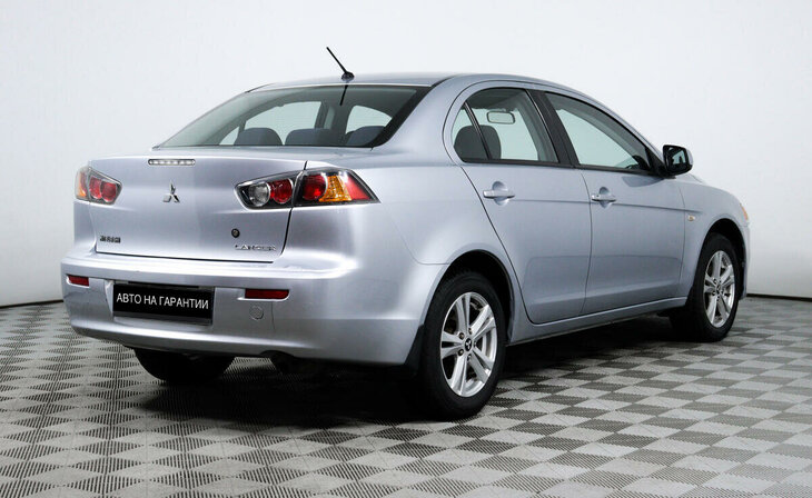 Mitsubishi Lancer - Фото 4