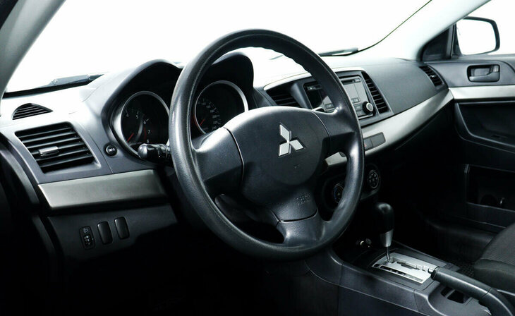 Mitsubishi Lancer - Фото 8