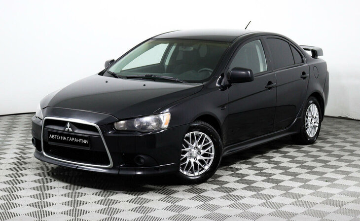 Mitsubishi Lancer - Фото 0