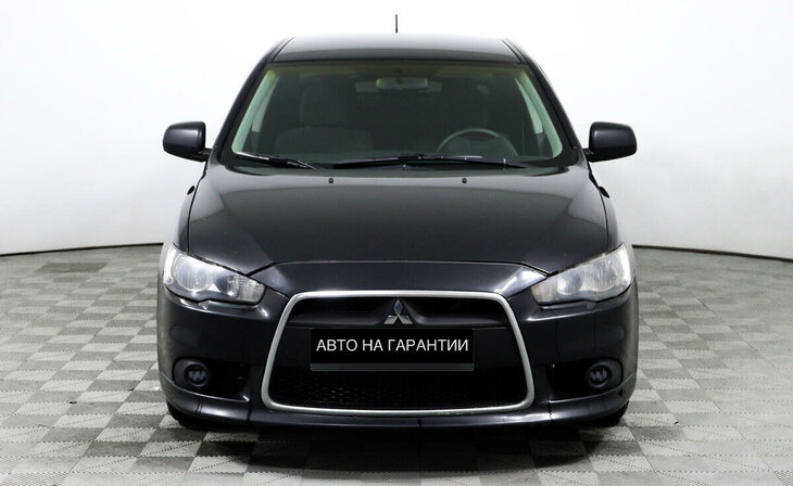 Mitsubishi Lancer - Фото 1