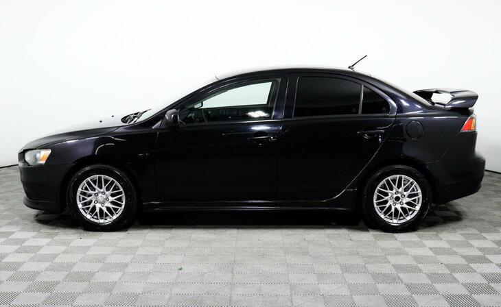 Mitsubishi Lancer - Фото 2