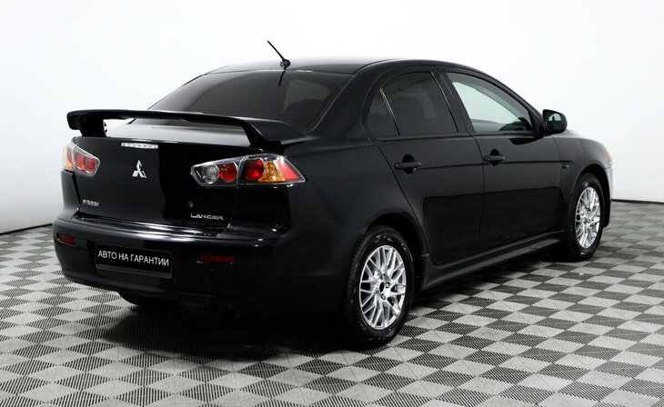 Mitsubishi Lancer - Фото 4