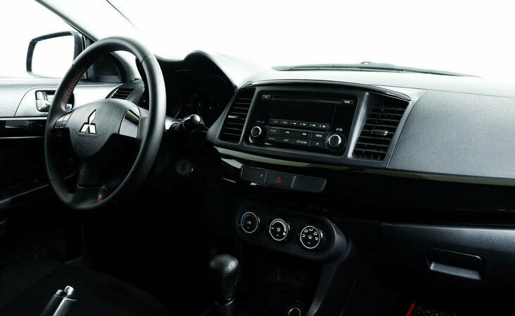 Mitsubishi Lancer - Фото 7